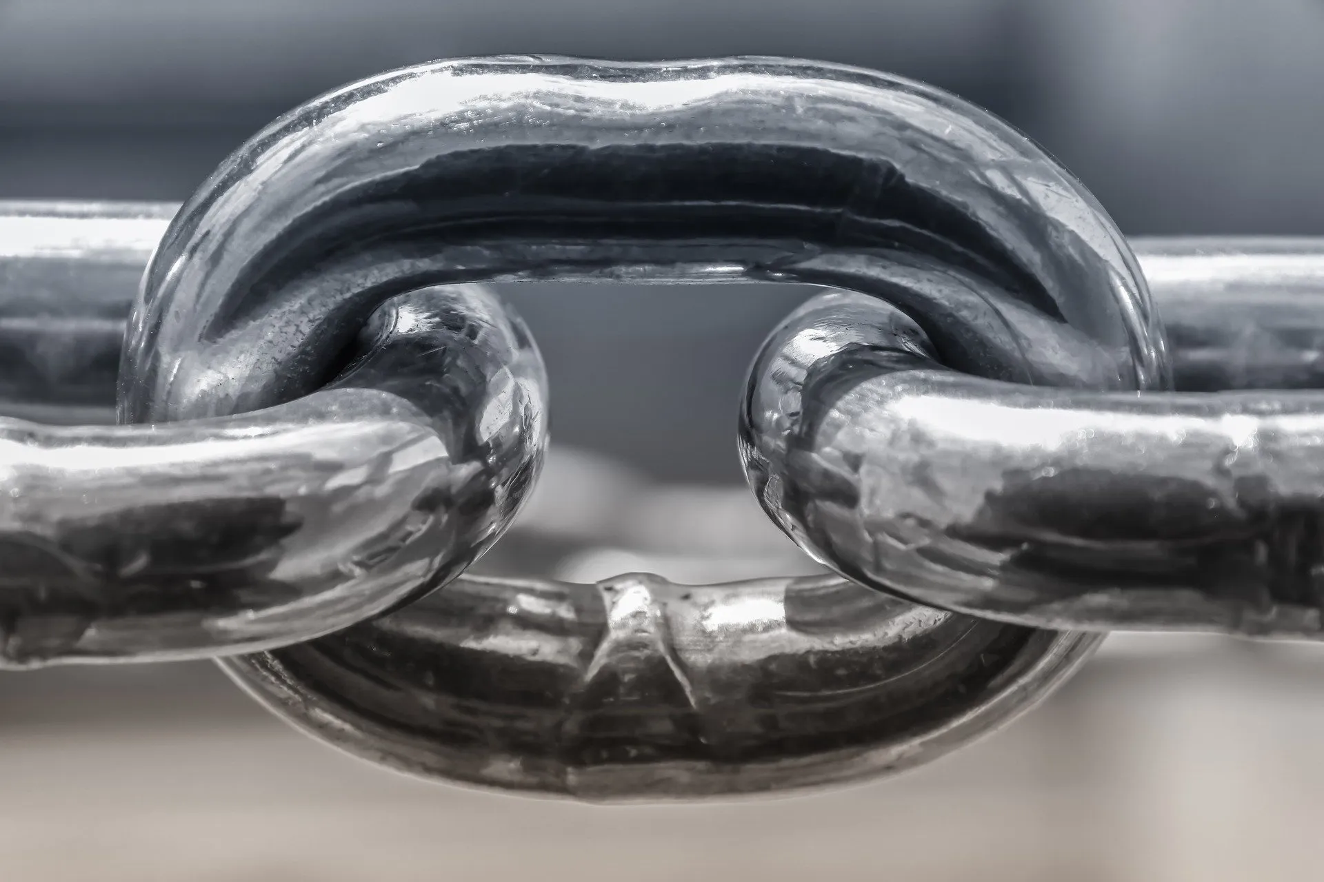 Durable stainless steel chain links illustrating high tensile strength ferrous metals
